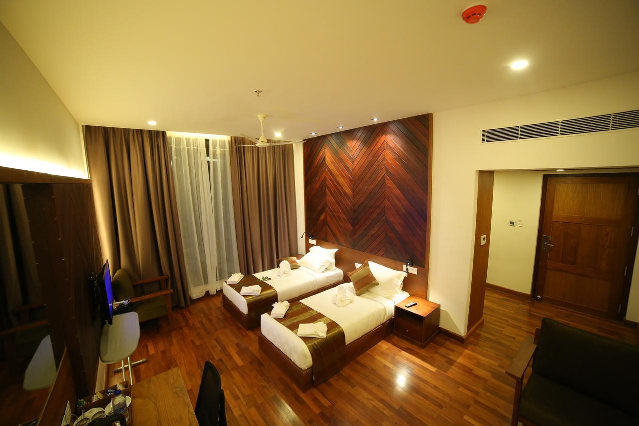 Woodies Bleisure Hotel Kozhikode Exterior photo